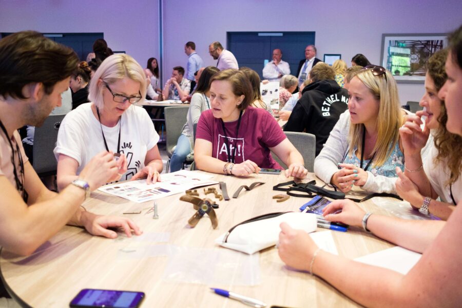 Give a Hand Team-Building Activity | CSR Team-Building | Lightbulb Teams